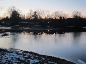 Sunset reflected in icy lake